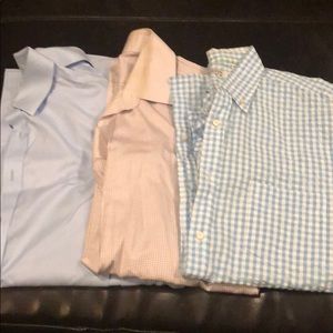 Three men’s dress shirts